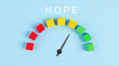 The word hope is standing on a paper, positive mindset, optimism for the future, progress bar, having faith and spirituality
